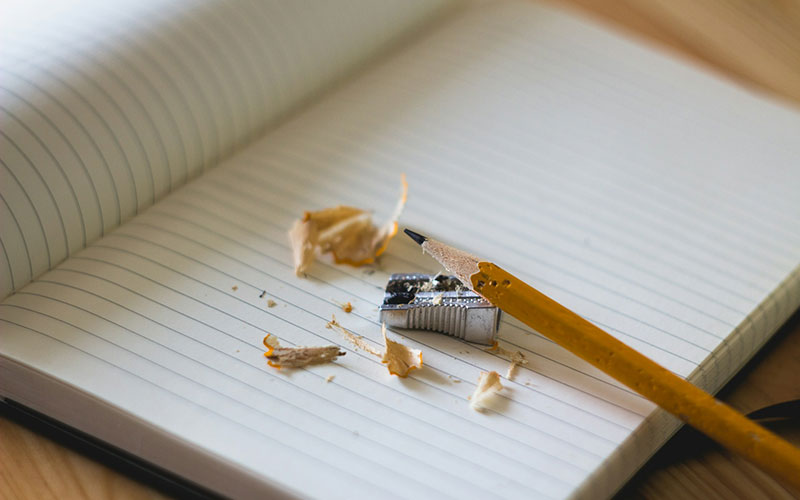 Notebook and pencil